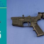 Disassemble an AR-15 Lower – AR-15 lower receiver staged to disassemble an AR-15 lower, shown on blue background